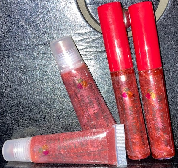 <transcy>Brillo de labios Smooth Kisses, Buddha Love, Amaretto, Angry Lillie</transcy>