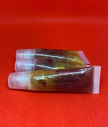 <transcy>Brillo de labios Smooth Kisses, Buddha Love, Amaretto, Angry Lillie</transcy>