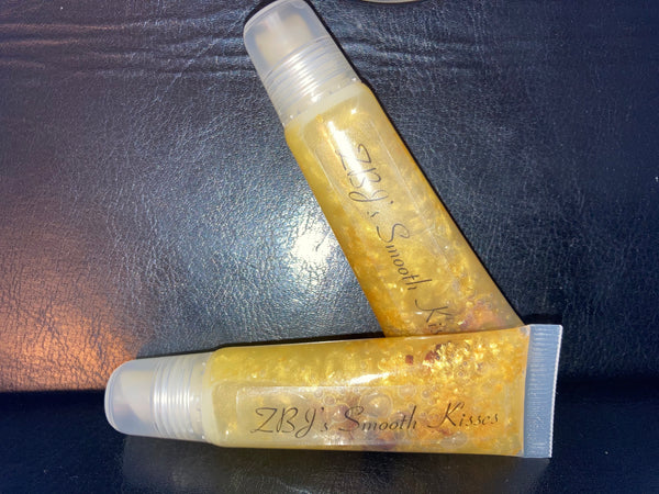 <transcy>Smooth Kisses Brillos de labios con infusión de rosas</transcy>